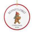 Personalized Baby's First Christmas 2026 ceramic ornament with a woodland bear carrying clementines