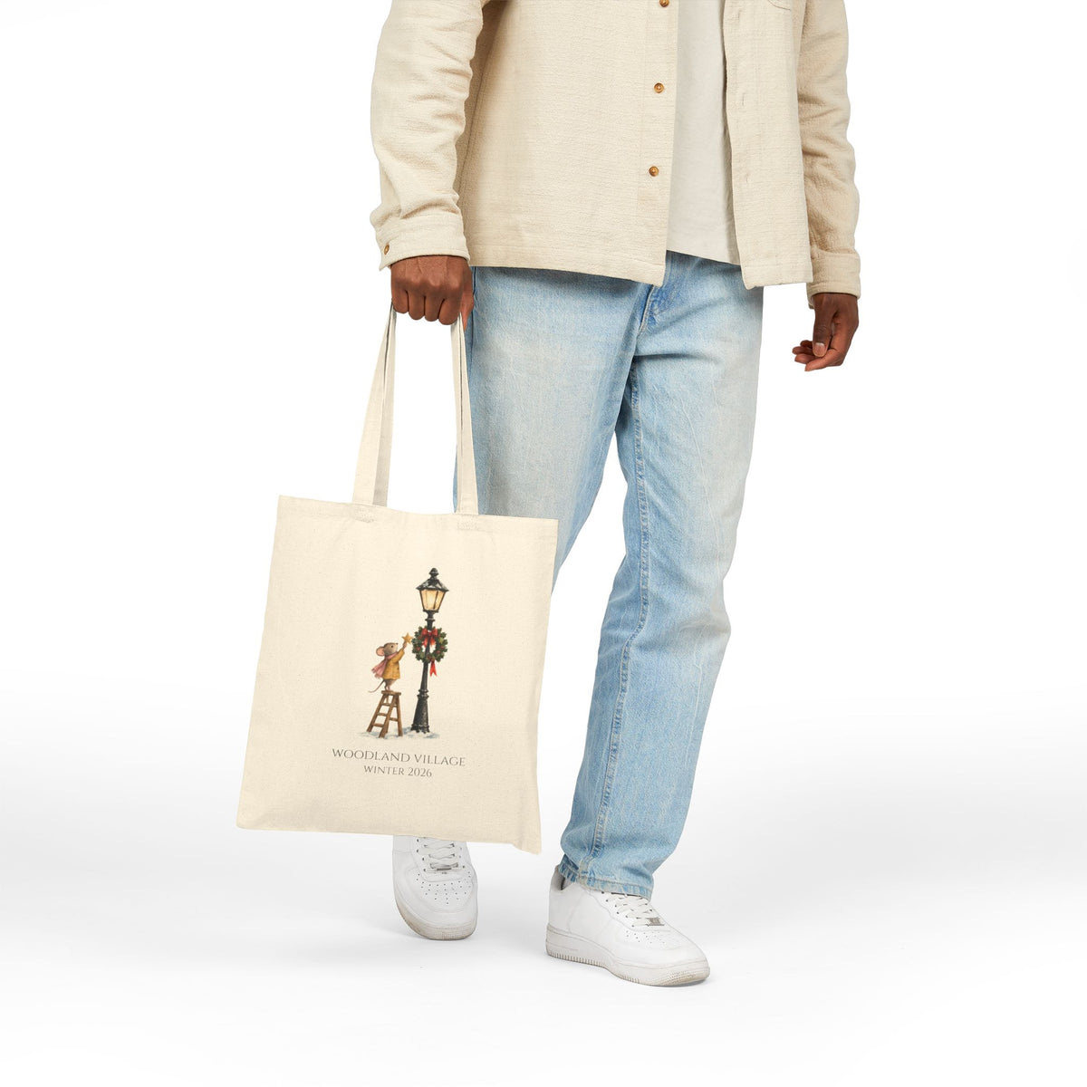 Person carrying the Woodland Mouse & Lamppost Christmas tote bag