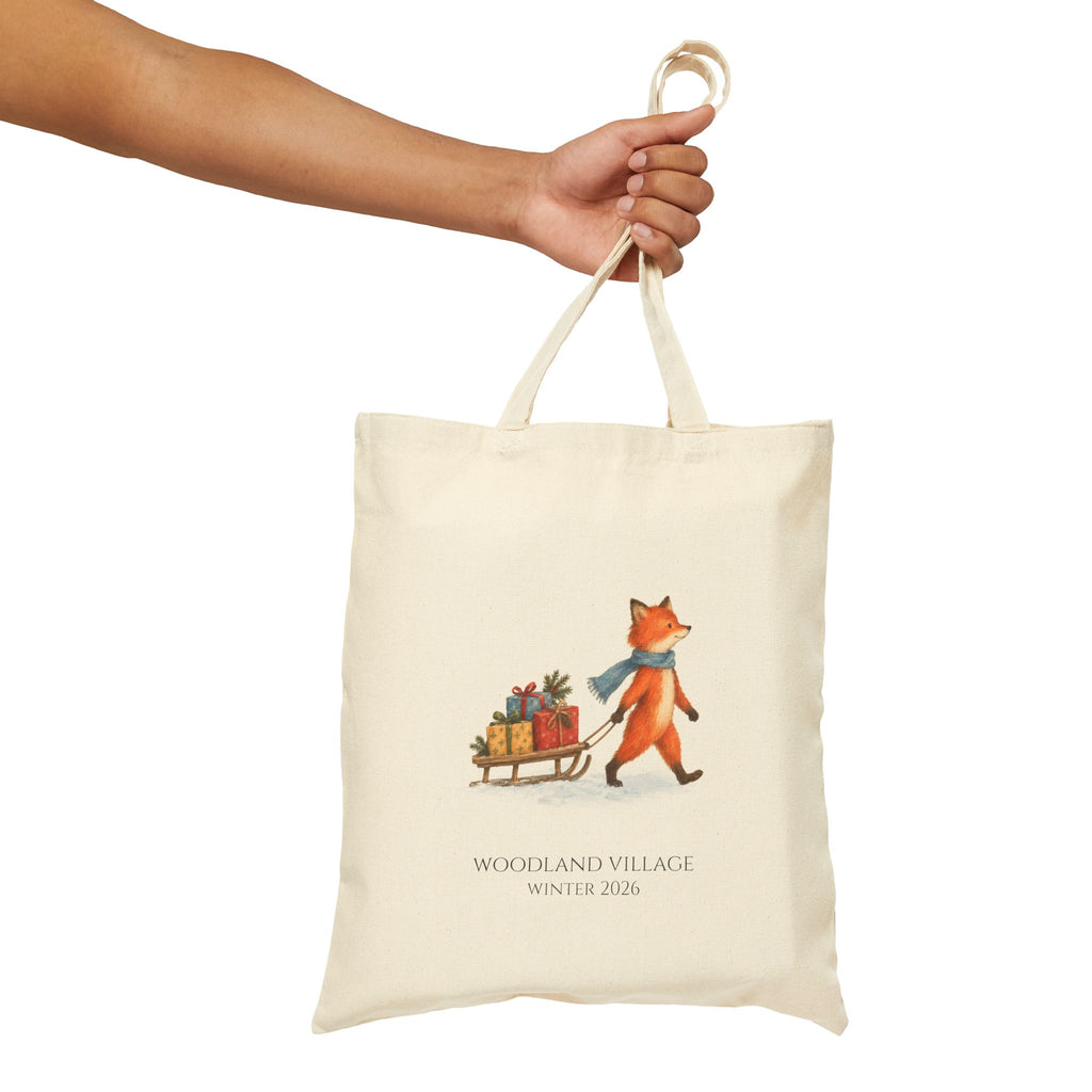 Hand holding the Woodland Fox tote by its canvas handles