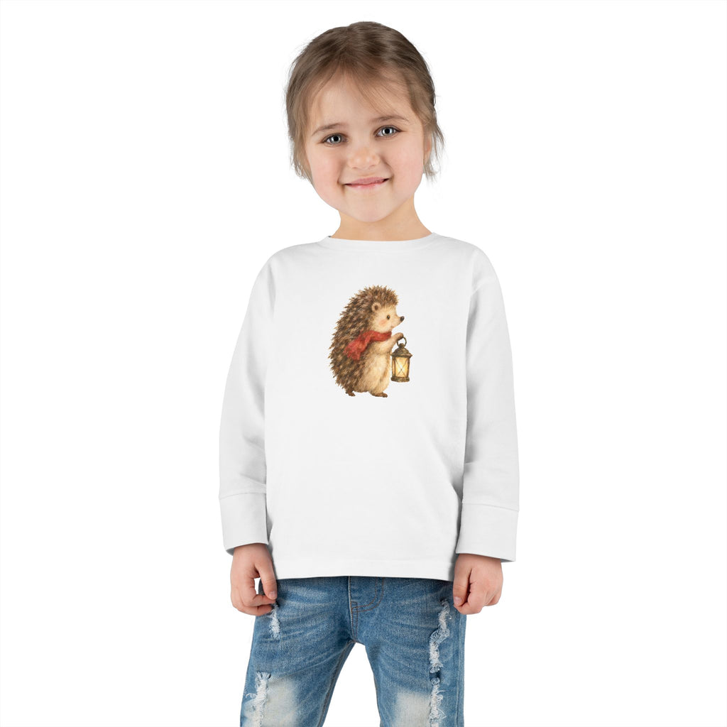 Child wearing the white Woodland Hedgehog lantern tee