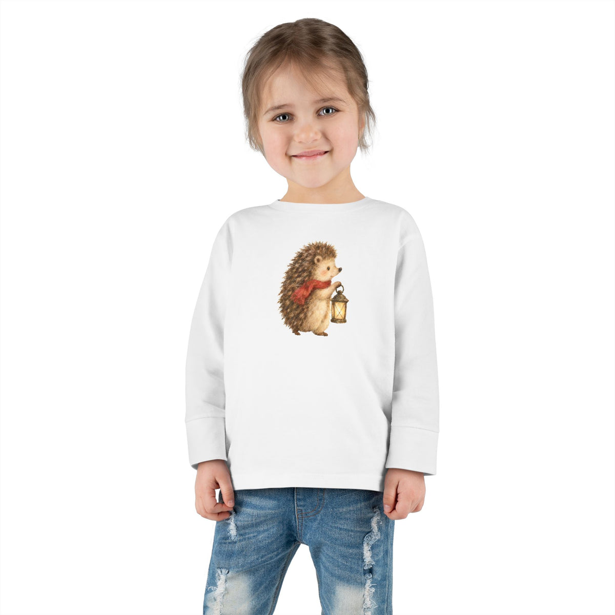 Child wearing the white Woodland Hedgehog lantern tee