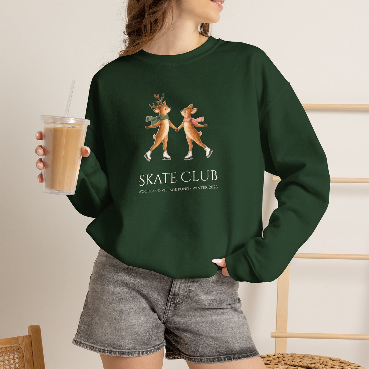 Woman wearing the Forest Green Skate Club sweatshirt